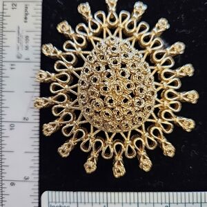 Elegant Gold Brooch By Monet
